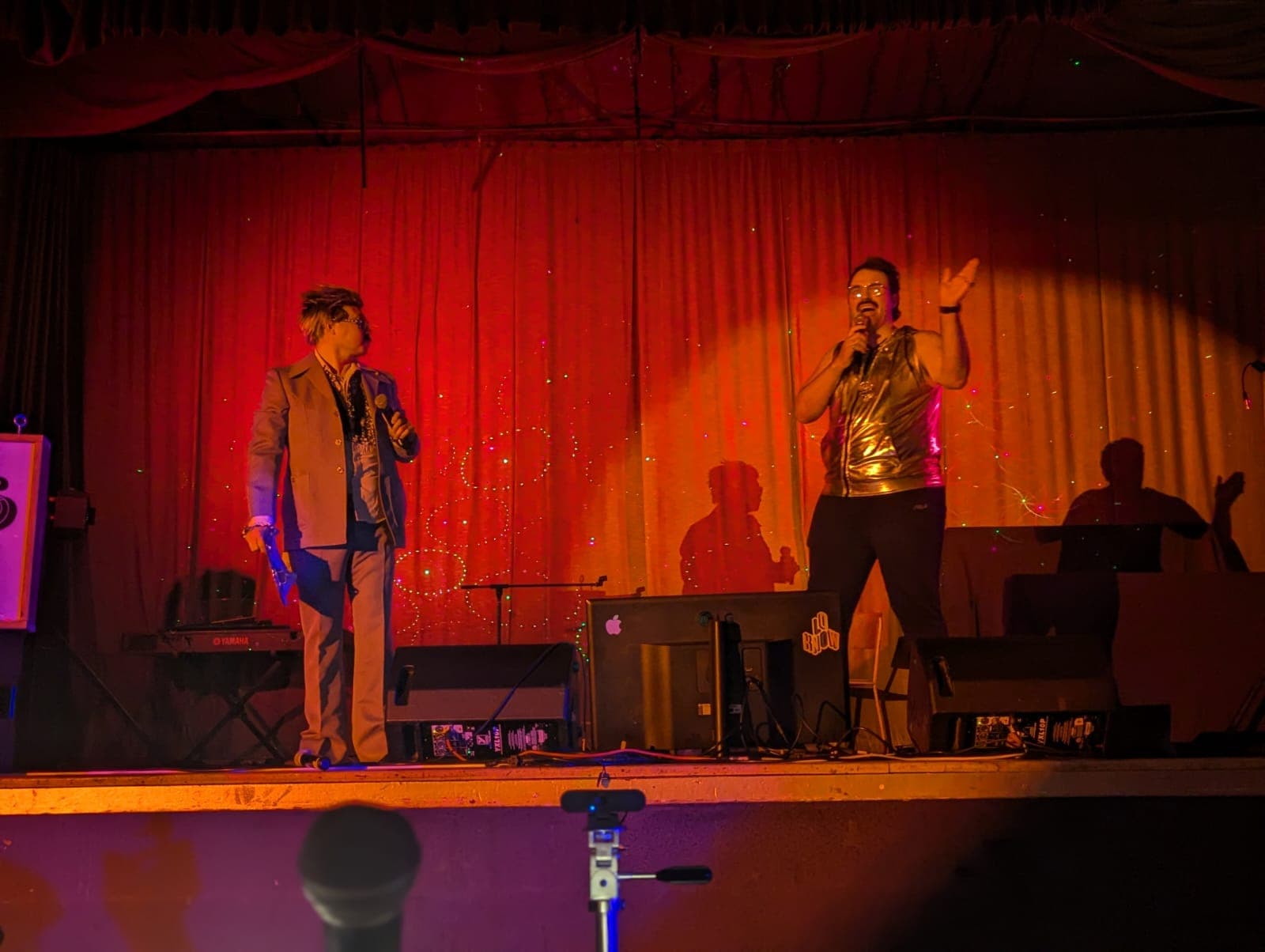 Last year's hosts on stage